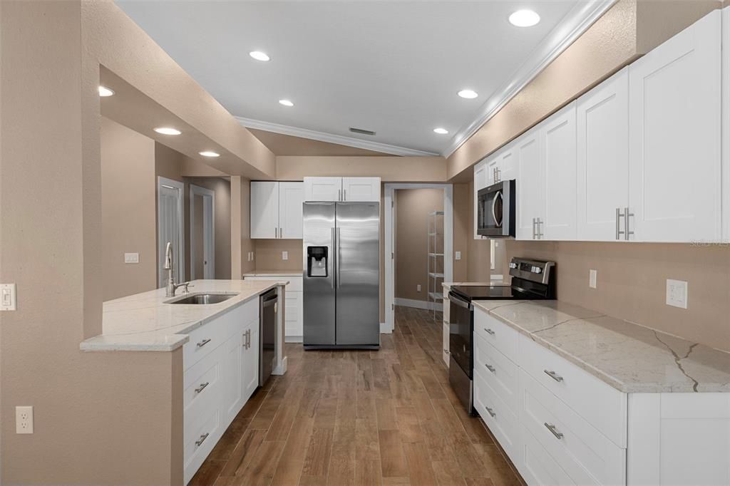 Interior, Kitchen, Recessed Lighting, Stainless Steel Appliances, Wood Texture Flooring