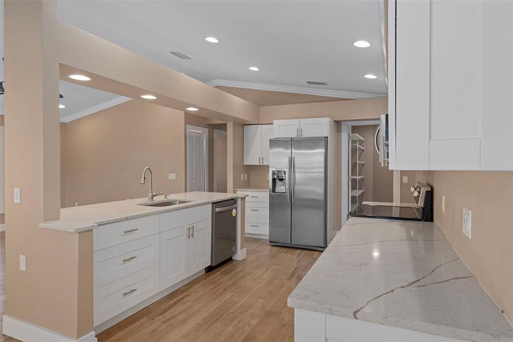 Interior, Kitchen, Recessed Lighting, Stainless Steel Appliances, Wood Texture Flooring