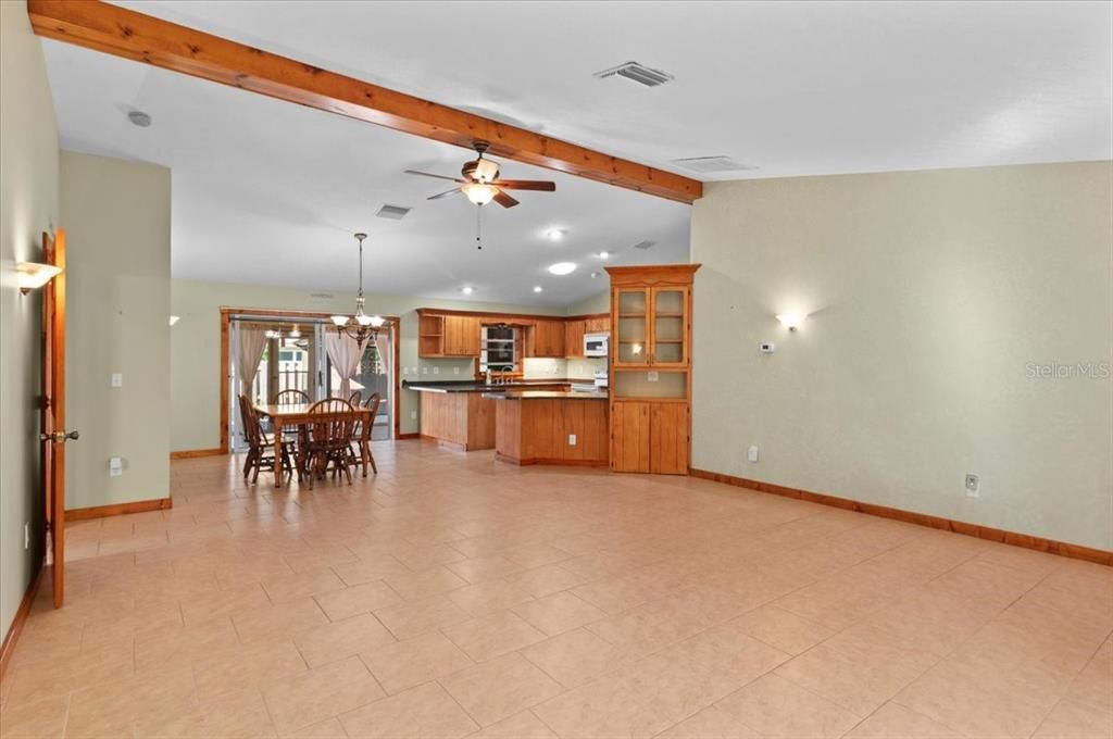 Chandelier, Dining room, Interior, Kitchen, Recessed Lighting, Stainless Steel Appliances, Wooden Beams
