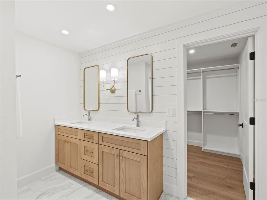 Bathroom, Dual Sink Vanities, Interior, Marble, Recessed Lighting, Walk-in Closets, Wood Texture Flooring