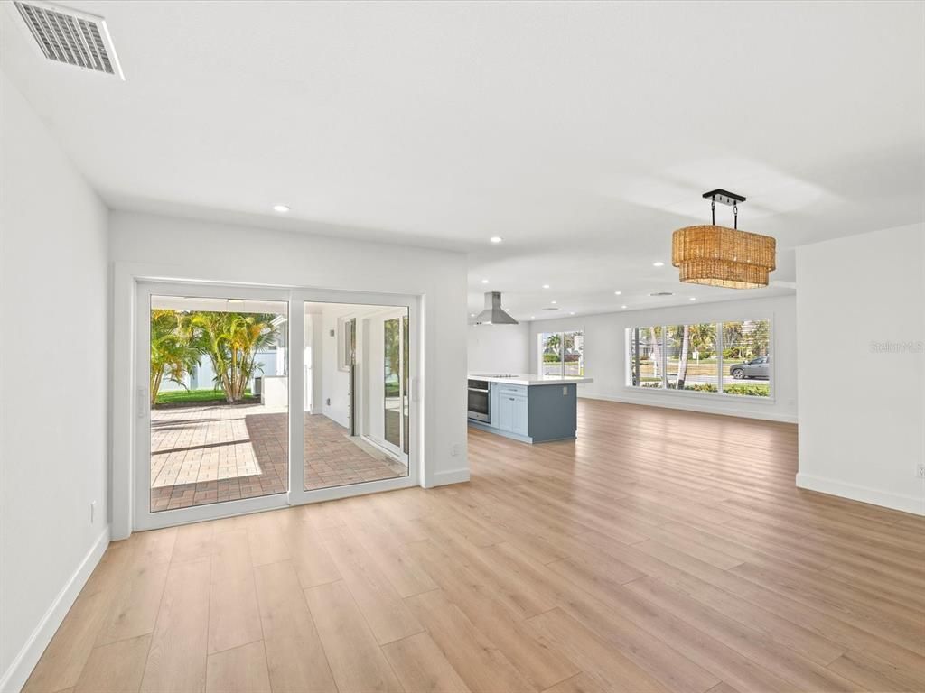 Chandelier, Empty room, Interior, Kitchen, Recessed Lighting, Wood Texture Flooring