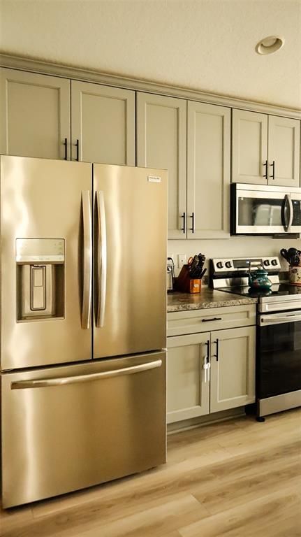 Interior, Kitchen, Recessed Lighting, Stainless Steel Appliances, Wood Texture Flooring