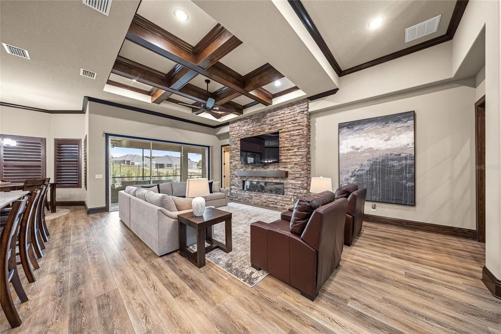 Fireplace, Interior, Living room, Recessed Lighting, Stone Walls, Wooden Beams, Wood Texture Flooring