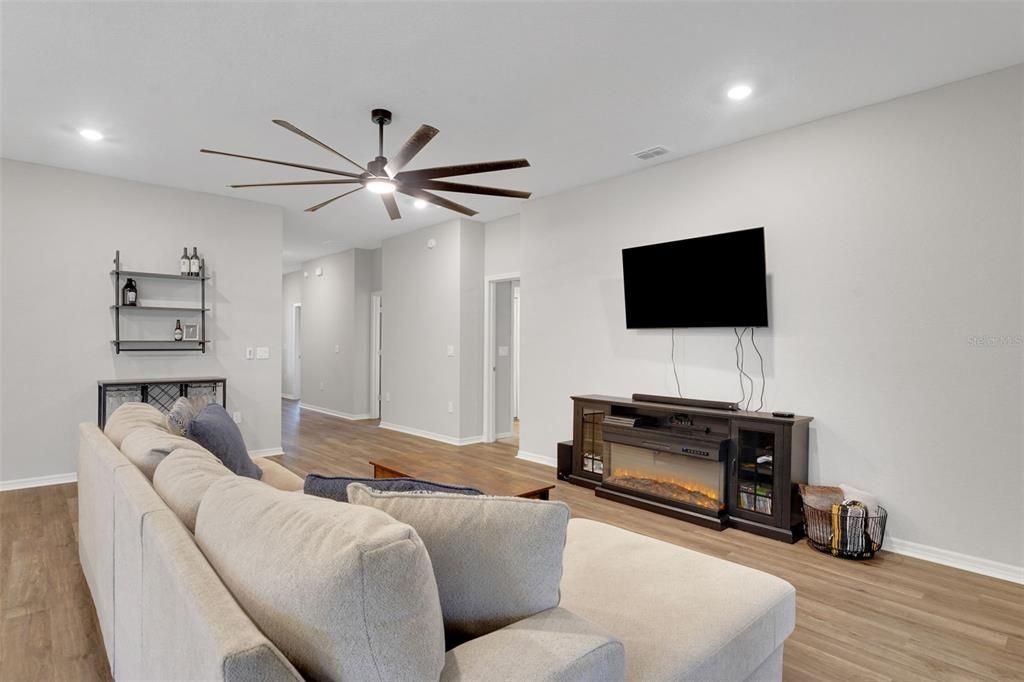 Fireplace, Interior, Living room, Recessed Lighting, Wood Texture Flooring