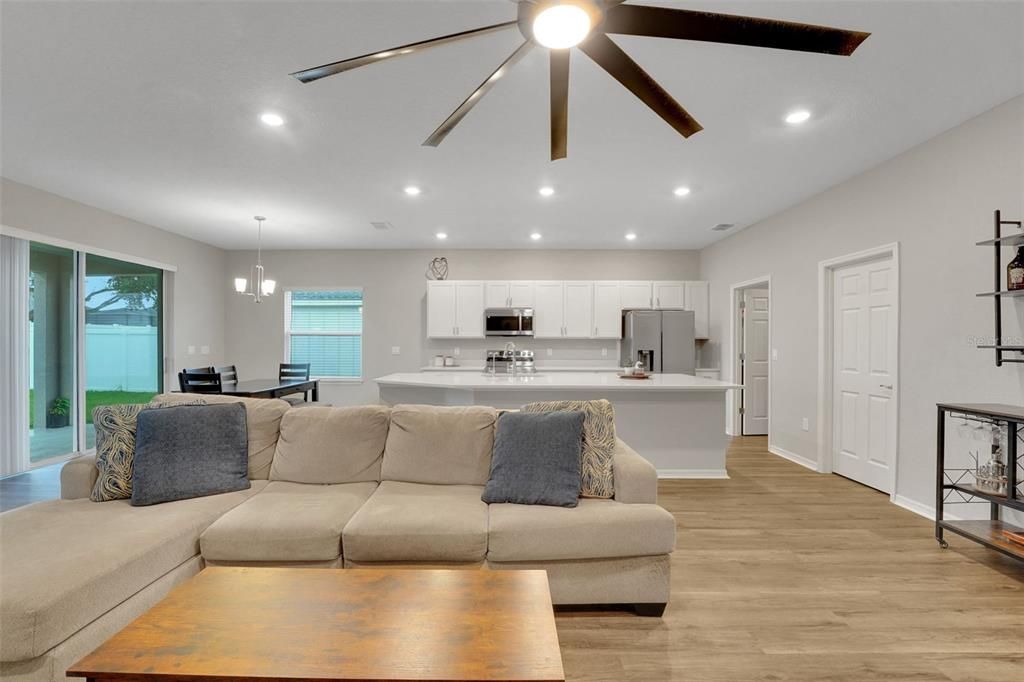 Dining room, Interior, Kitchen, Living room, Pendant Lights, Recessed Lighting, Stainless Steel Appliances, Wood Texture Flooring