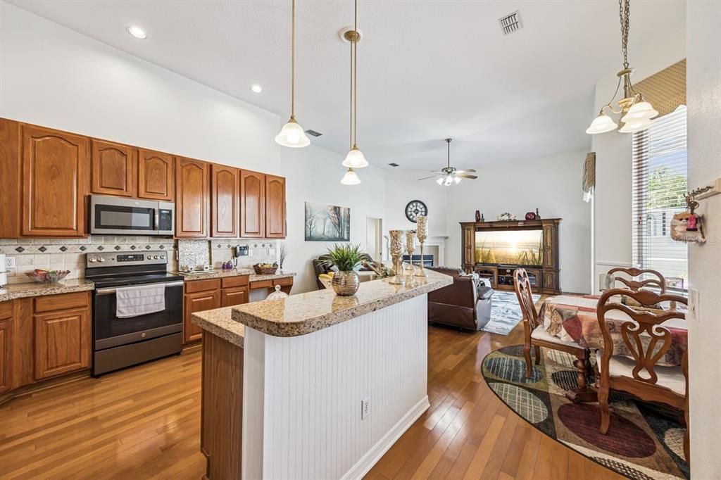 Dining room, Interior, Kitchen, Living room, Pendant Lights, Recessed Lighting, Wood Texture Flooring