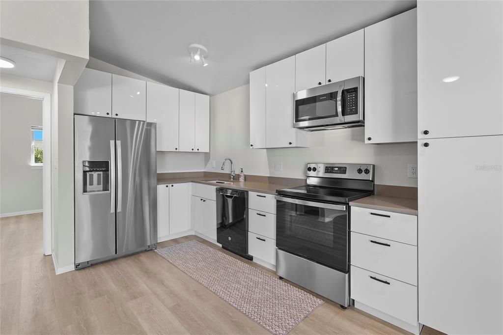 Interior, Kitchen, Recessed Lighting, Stainless Steel Appliances, Wood Texture Flooring