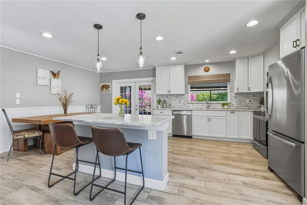 Interior, Kitchen, Pendant Lights, Recessed Lighting, Stainless Steel Appliances, Wood Texture Flooring
