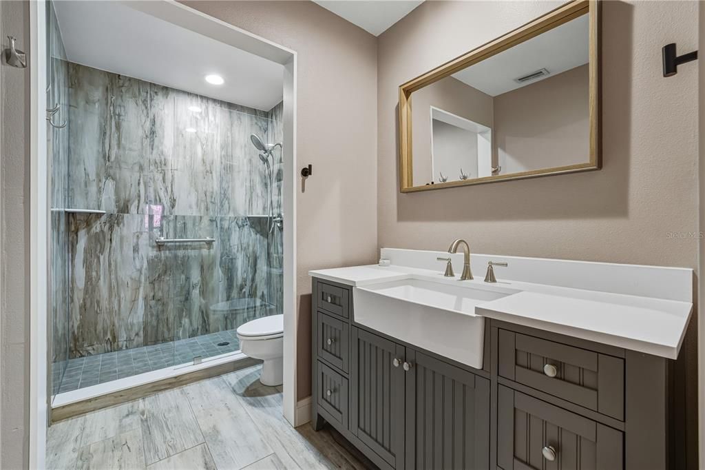 Bathroom, Glass Shower, Interior, Recessed Lighting, Wood Texture Flooring