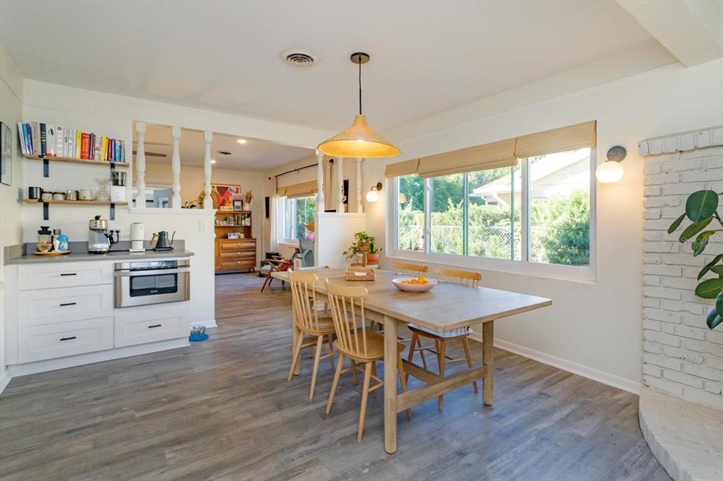 Dining room, Interior, Kitchen, Pendant Lights, Recessed Lighting, Stainless Steel Appliances, Stone Walls, Wood Texture Flooring