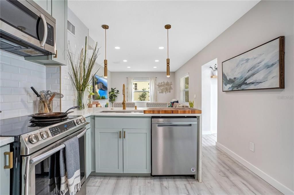 Interior, Kitchen, Pendant Lights, Recessed Lighting, Stainless Steel Appliances, Wood Texture Flooring
