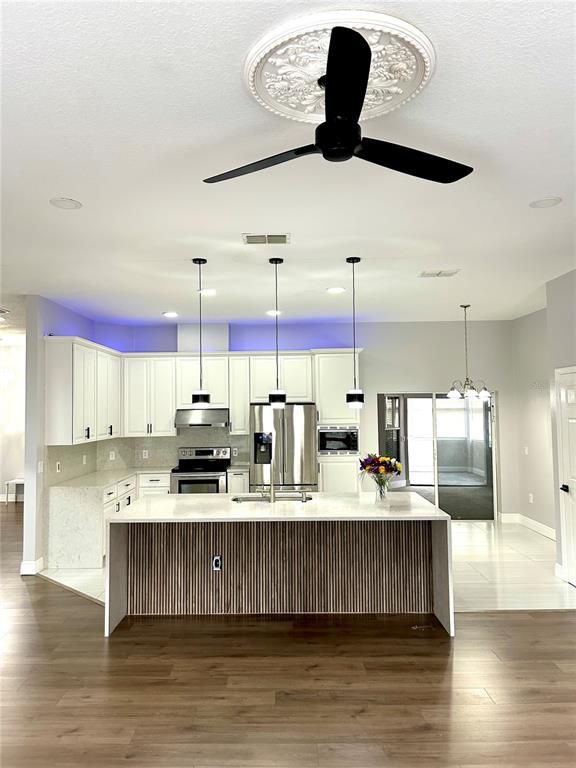 Interior, Kitchen, Pendant Lights, Recessed Lighting, Stainless Steel Appliances, Wood Texture Flooring