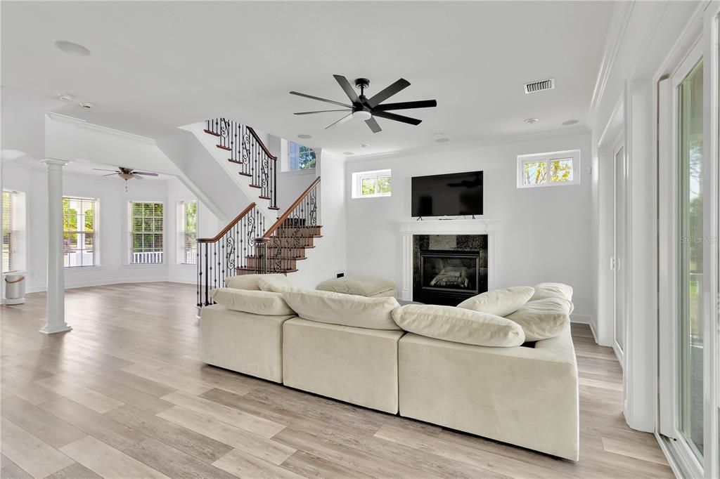 Fireplace, Interior, Living room, Recessed Lighting, Wood Texture Flooring