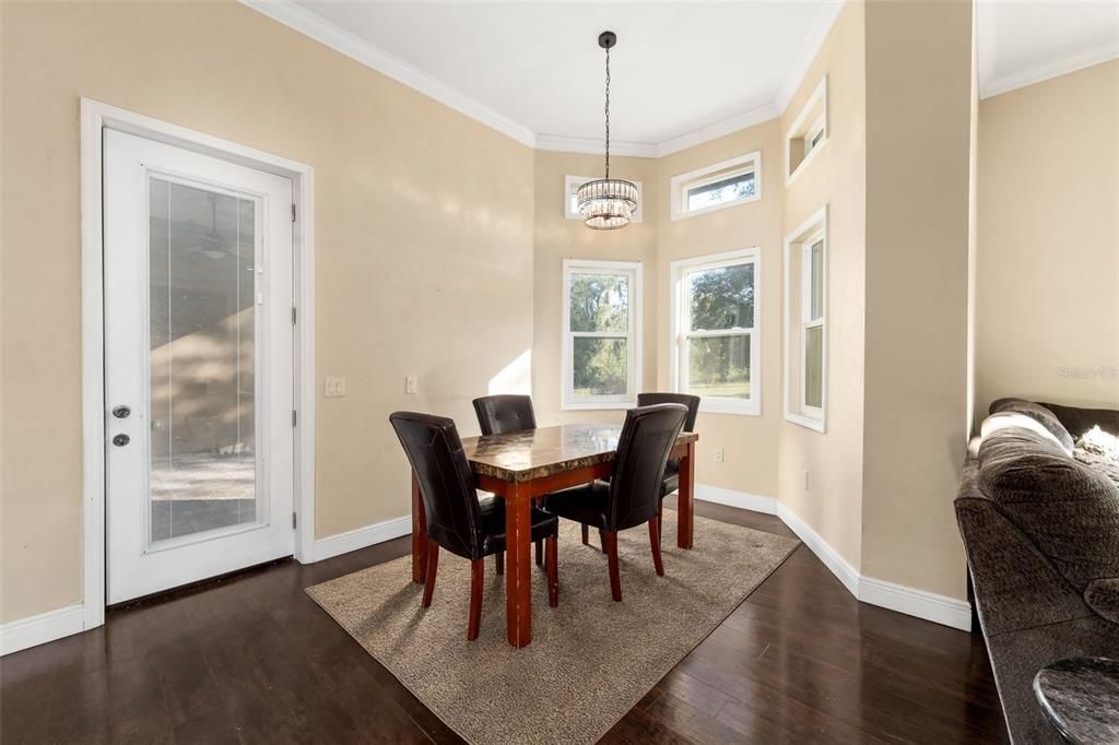Chandelier, Dining room, Interior, Pendant Lights, Wood Texture Flooring