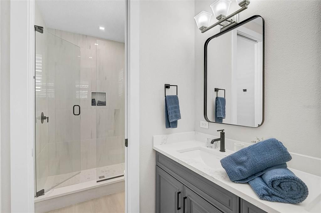 Bathroom, Glass Shower, Interior, Recessed Lighting, Wood Texture Flooring