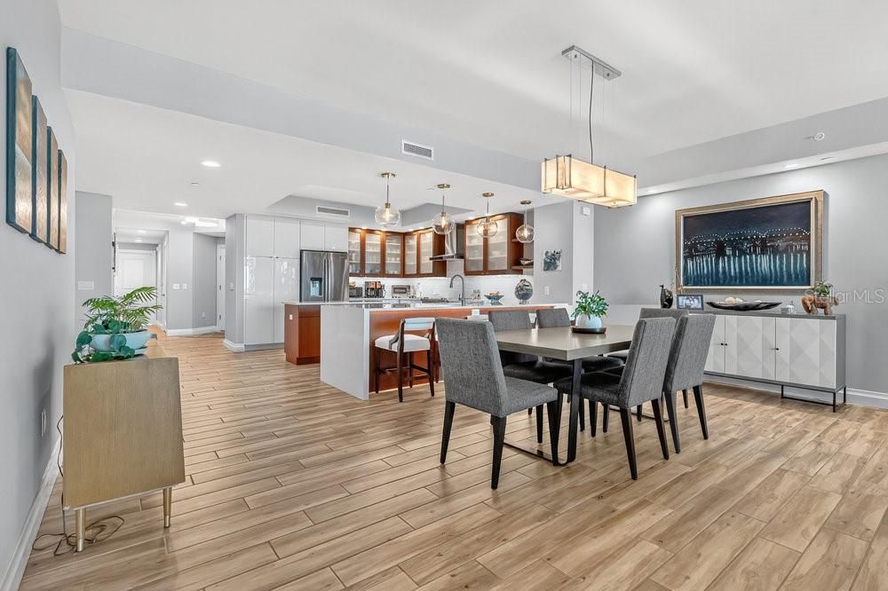 Dining room, Interior, Kitchen, Pendant Lights, Recessed Lighting, Stainless Steel Appliances, Wood Texture Flooring