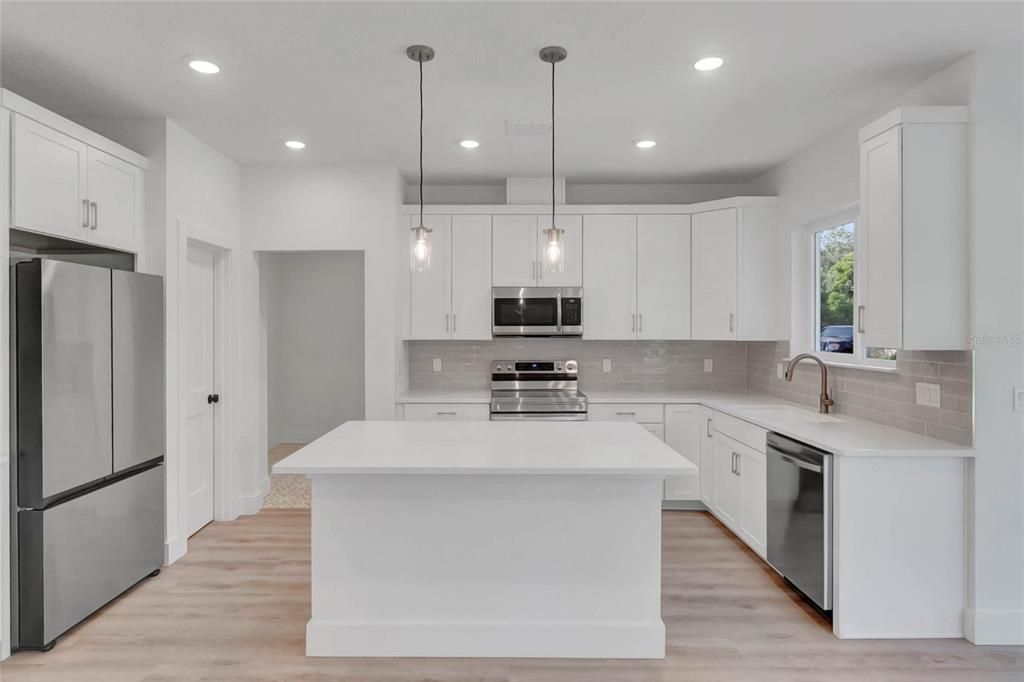 Interior, Kitchen, Pendant Lights, Recessed Lighting, Stainless Steel Appliances, Wood Texture Flooring