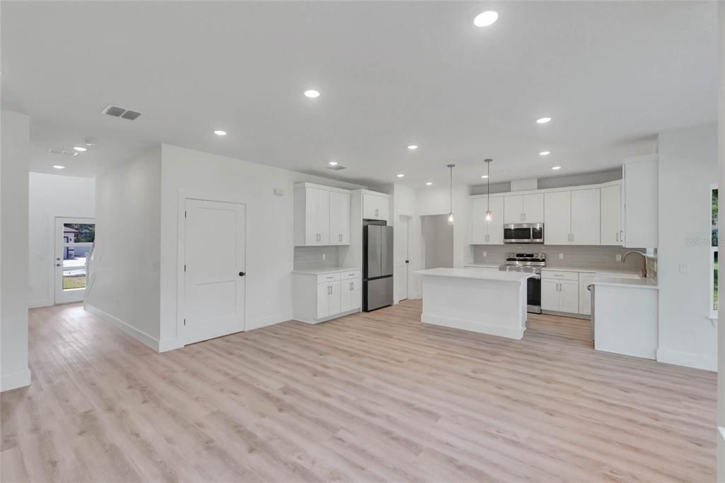 Interior, Kitchen, Pendant Lights, Recessed Lighting, Stainless Steel Appliances, Wood Texture Flooring