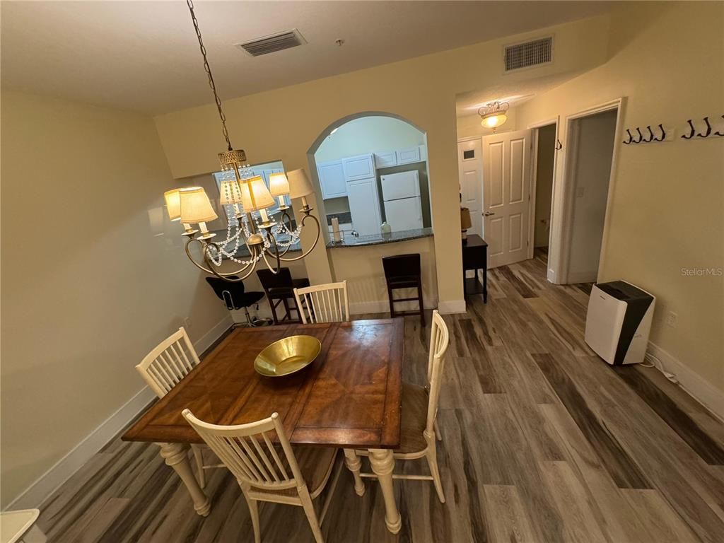 Chandelier, Dining room, Interior, Wood Texture Flooring