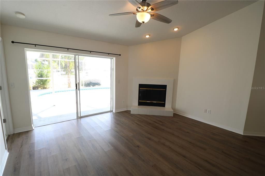 Empty room, Fireplace, Interior, Recessed Lighting, Wood Texture Flooring