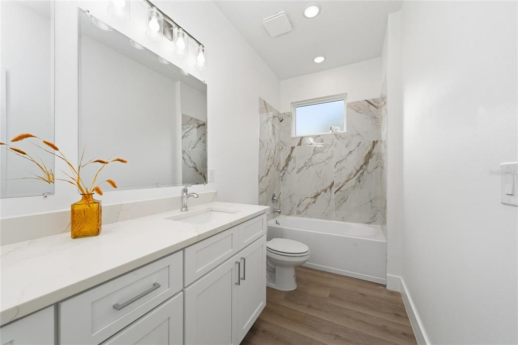 Bathroom, Interior, Marble Walls, Recessed Lighting, Wood Texture Flooring