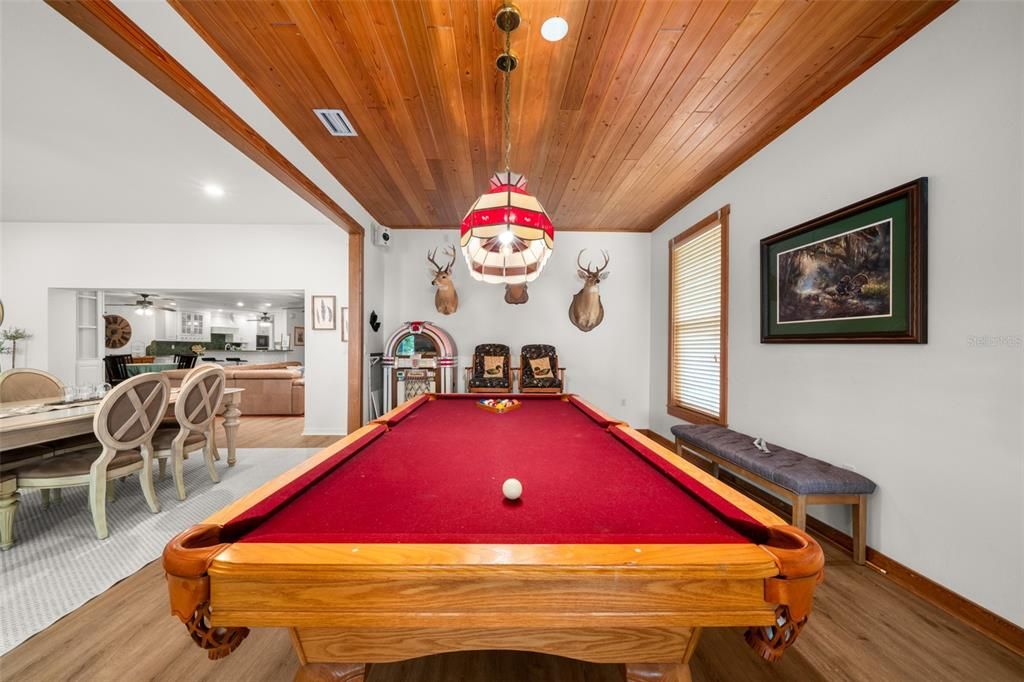 Billiard Table, Chandelier, Dining room, Game Room, Interior, Pendant Lights, Recessed Lighting, Wooden Ceilings, Wood Texture Flooring