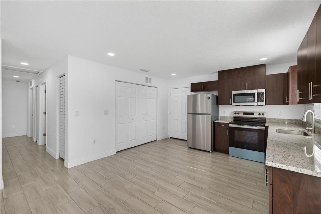 Interior, Kitchen, Recessed Lighting, Stainless Steel Appliances, Wood Texture Flooring