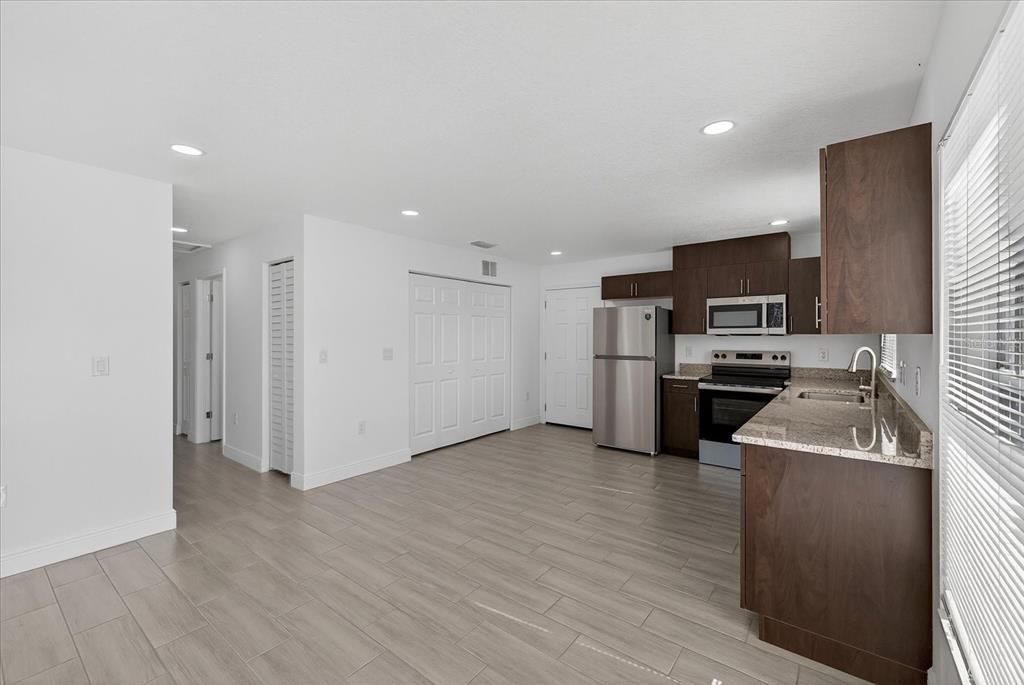 Interior, Kitchen, Recessed Lighting, Stainless Steel Appliances, Wood Texture Flooring