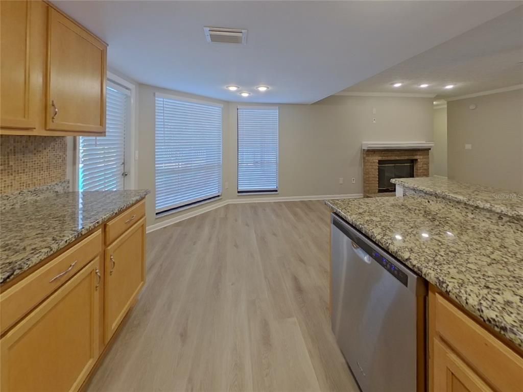 Fireplace, Interior, Kitchen, Recessed Lighting, Wood Texture Flooring