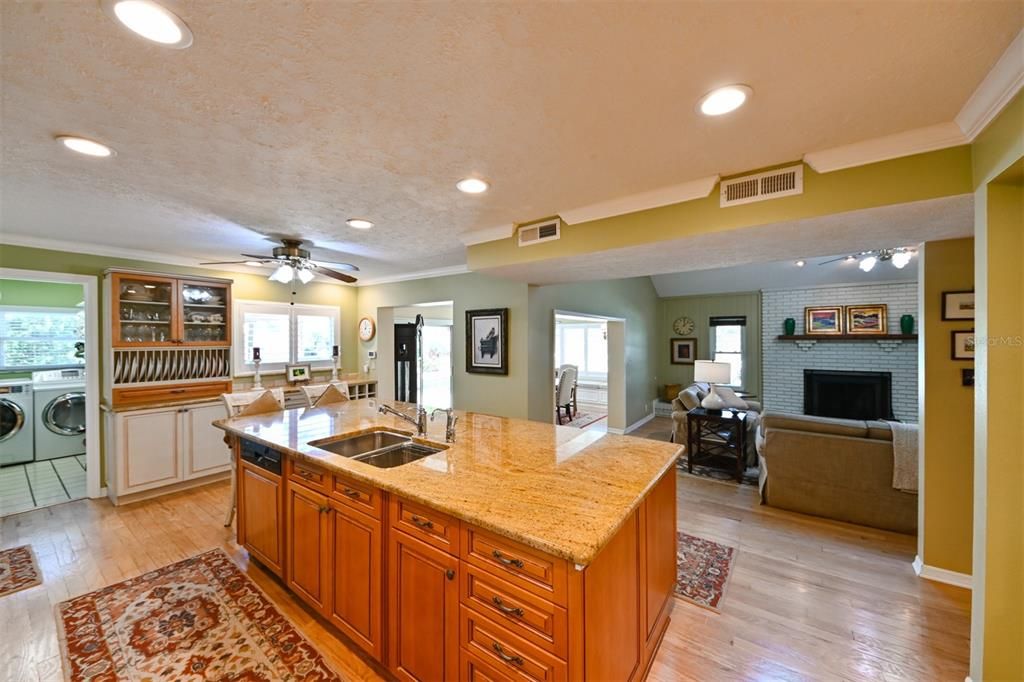 Fireplace, Interior, Kitchen, Living room, Recessed Lighting, Washer, Wood Texture Flooring