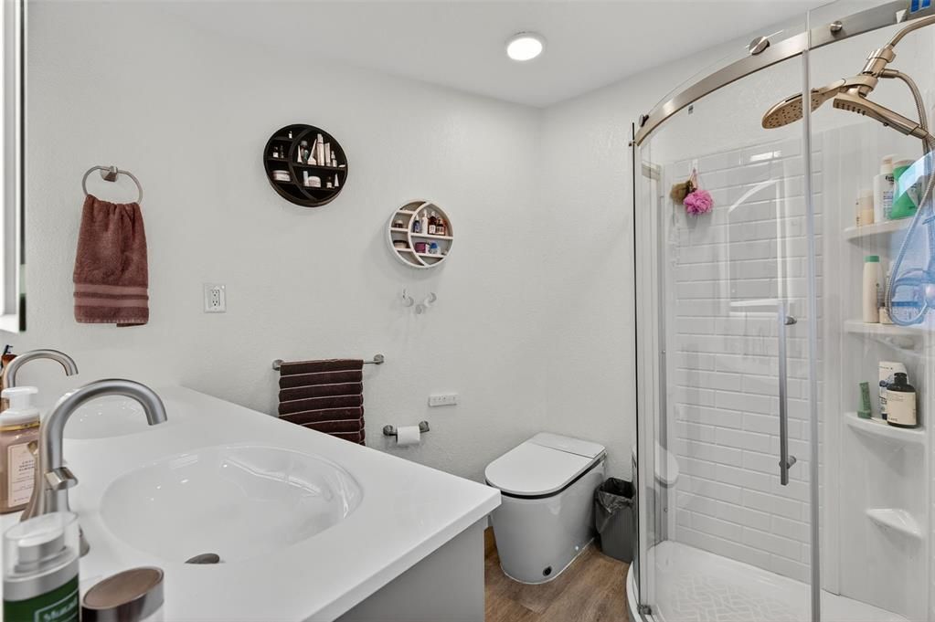 Bathroom, Glass Shower, Interior, Recessed Lighting, Wood Texture Flooring