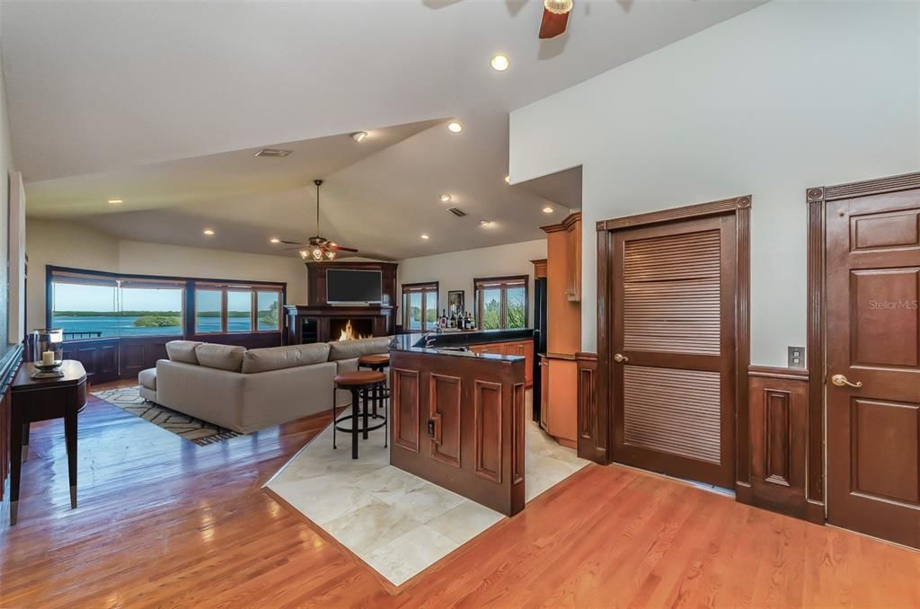 Fireplace, Interior, Living room, Recessed Lighting, Wood Texture Flooring