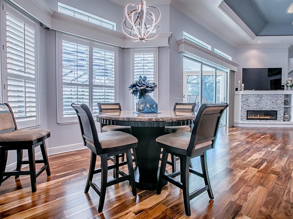 Chandelier, Dining room, Fireplace, Interior, Recessed Lighting, Wood Texture Flooring