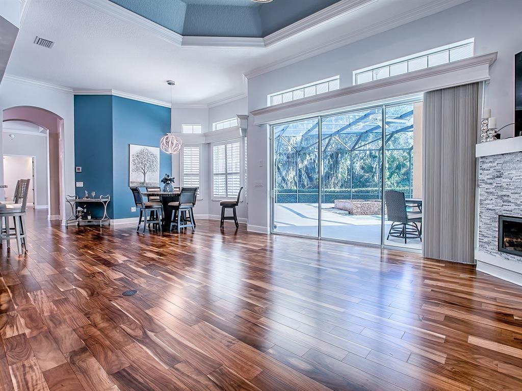 Dining room, Fireplace, Interior, Pendant Lights, Wood Texture Flooring