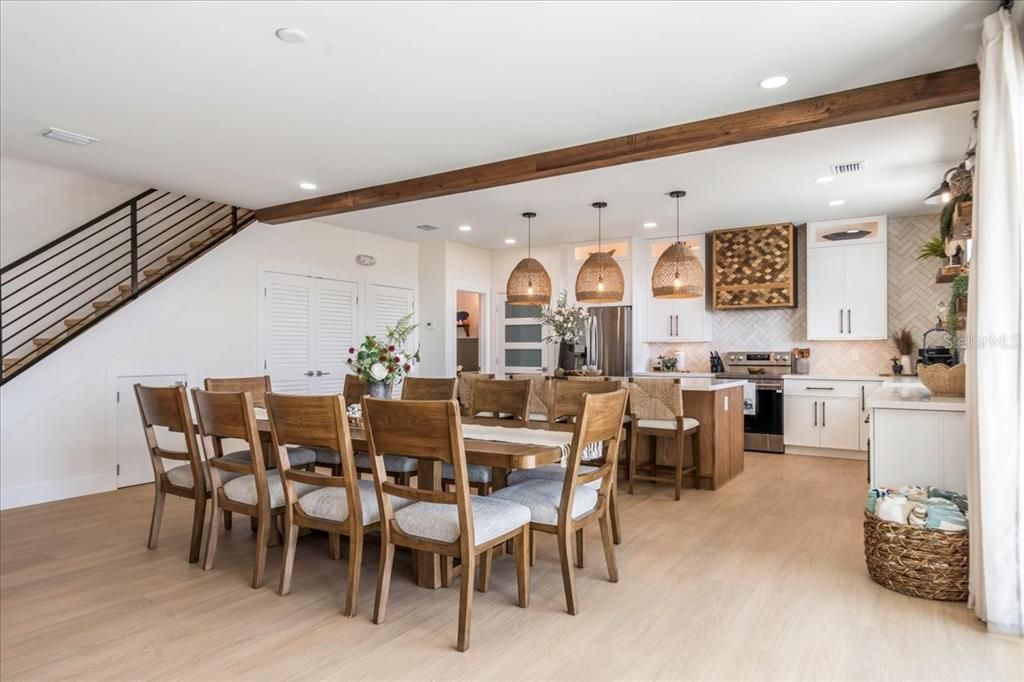 Dining room, Interior, Kitchen, Pendant Lights, Recessed Lighting, Stainless Steel Appliances, Wood Texture Flooring
