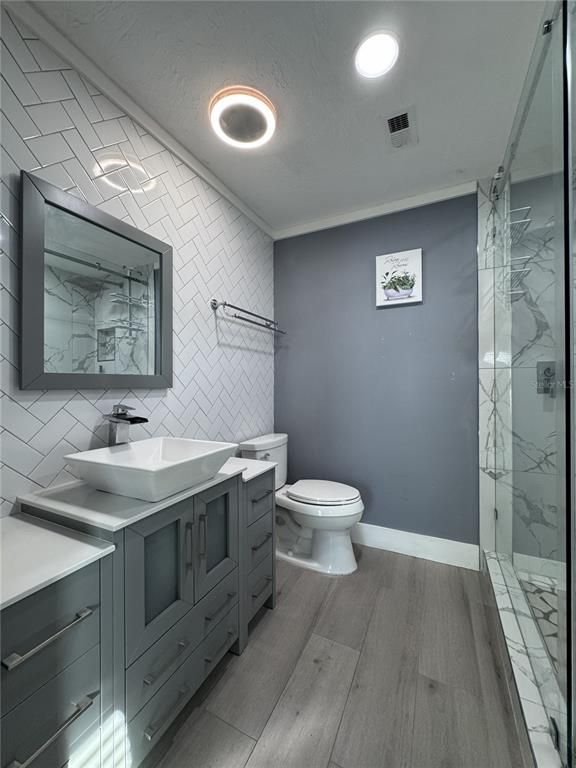 Bathroom, Glass Shower, Interior, Recessed Lighting, Wood Texture Flooring