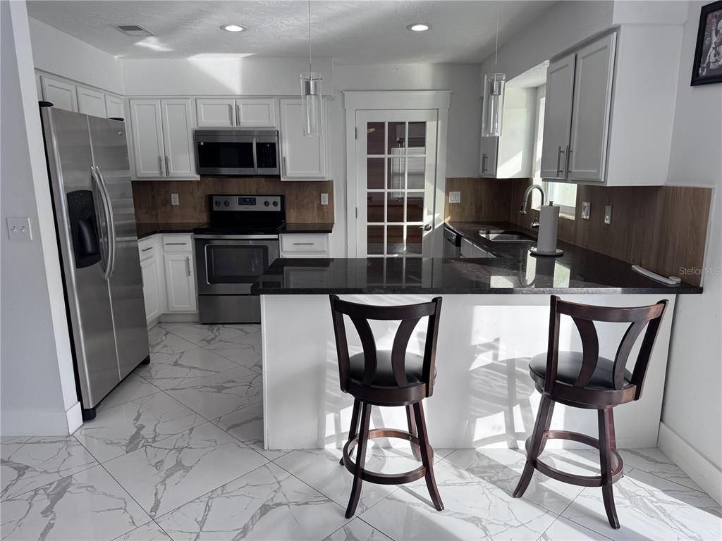 Interior, Kitchen, Marble, Pendant Lights, Recessed Lighting, Stainless Steel Appliances