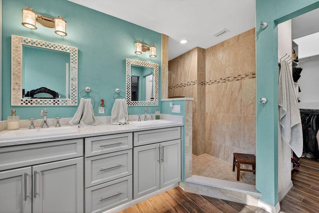 Bathroom, Dual Sink Vanities, Glass Shower, Interior, Recessed Lighting, Wood Texture Flooring