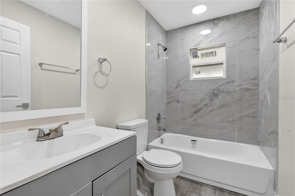 Bathroom, Interior, Marble Walls, Recessed Lighting, Wood Texture Flooring