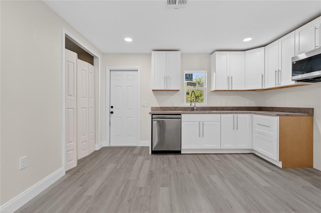 Interior, Kitchen, Recessed Lighting, Stainless Steel Appliances, Wood Texture Flooring