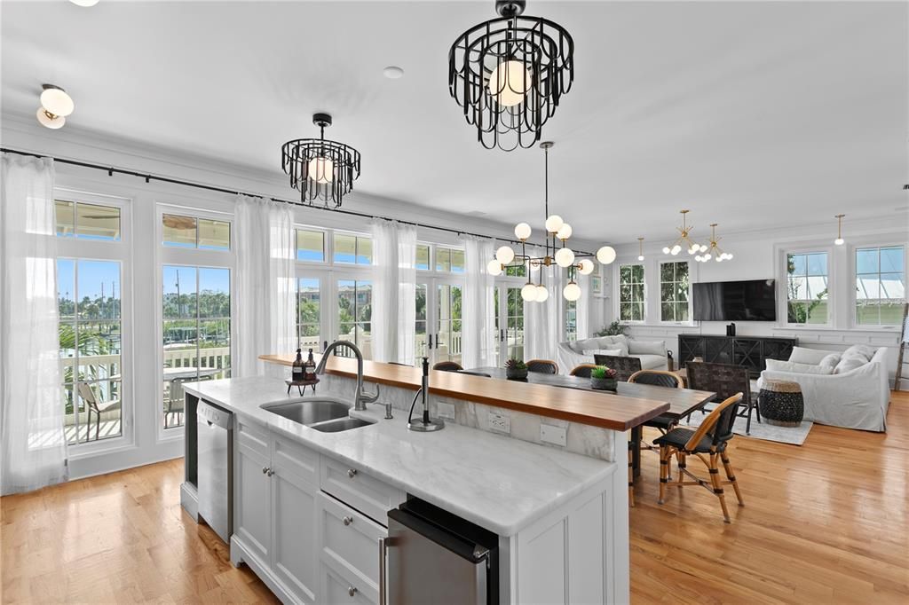 Dining room, Fireplace, Interior, Kitchen, Living room, Pendant Lights, Wood Texture Flooring