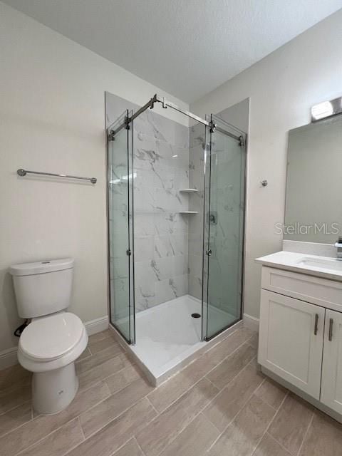 Bathroom, Glass Shower, Interior, Marble Walls, Wood Texture Flooring