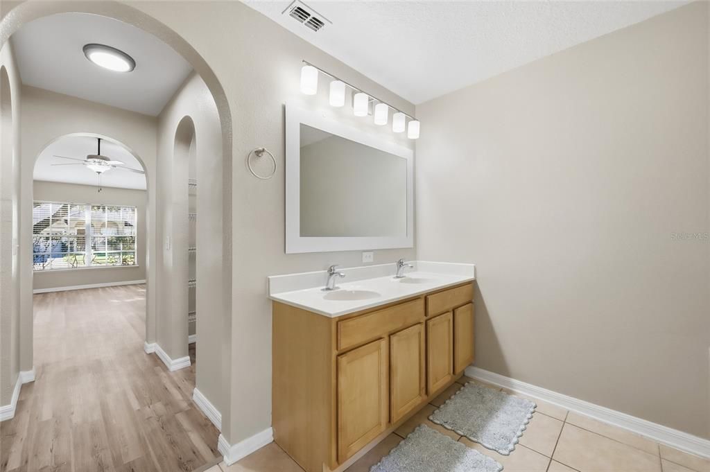 Bathroom, Dual Sink Vanities, Interior, Recessed Lighting, Wood Texture Flooring