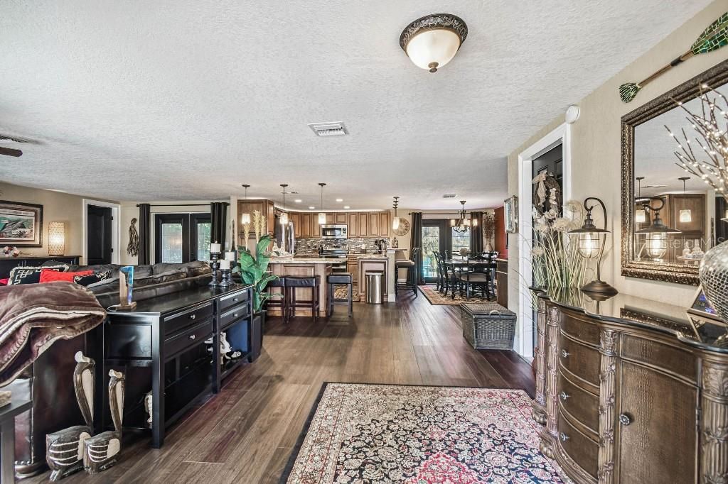 Dining room, Interior, Kitchen, Pendant Lights, Stainless Steel Appliances, Wood Texture Flooring