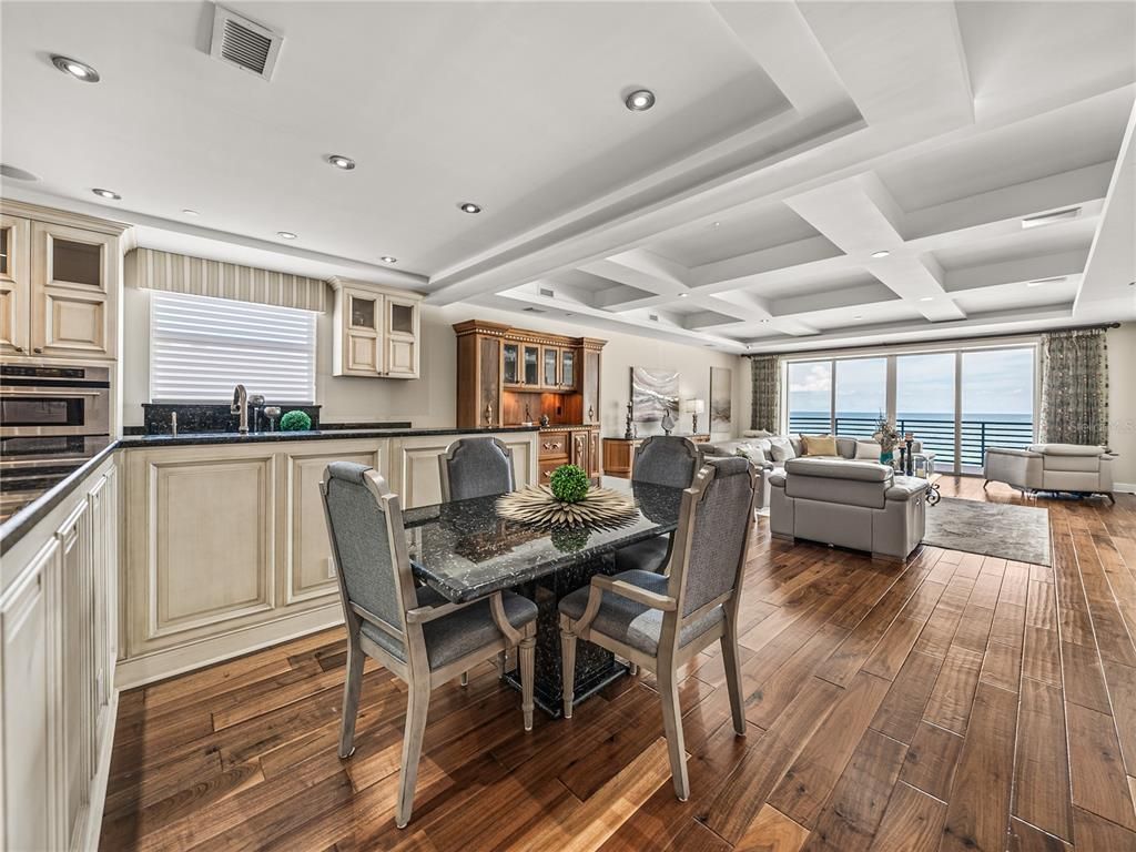 Dining room, Interior, Kitchen, Living room, Recessed Lighting, Water, Wood Texture Flooring