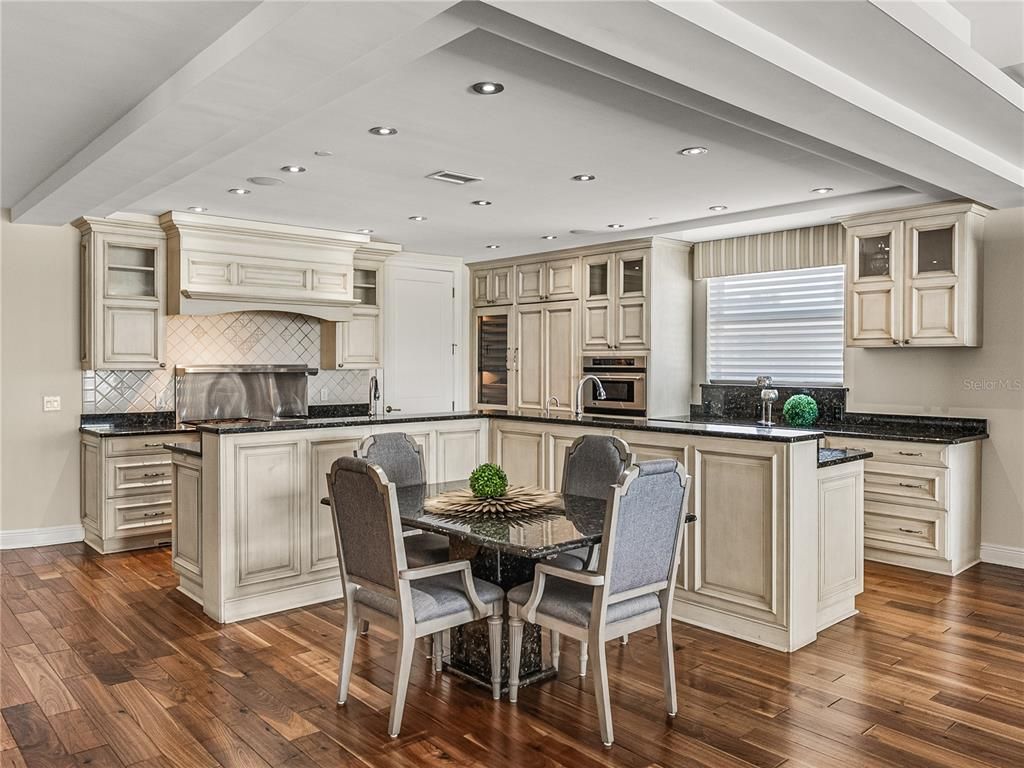 Dining room, Interior, Kitchen, Recessed Lighting, Stainless Steel Appliances, Wood Texture Flooring