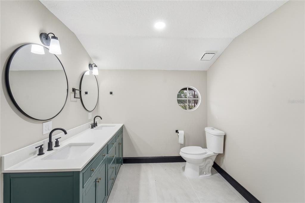 Bathroom, Dual Sink Vanities, Interior, Recessed Lighting, Wood Texture Flooring