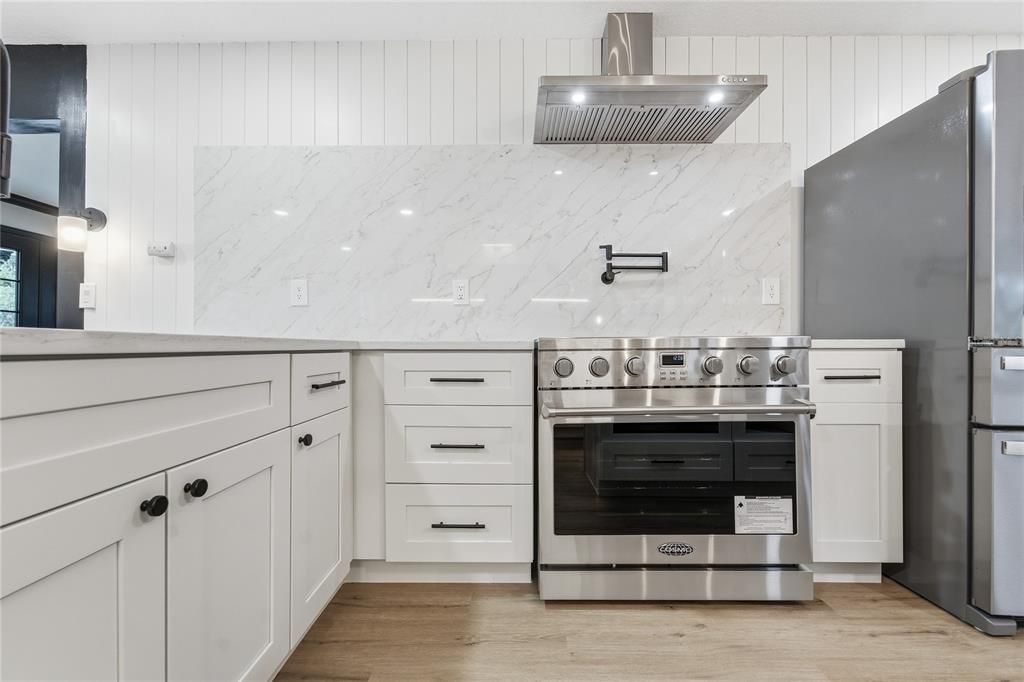 Interior, Kitchen, Marble Walls, Stainless Steel Appliances, Wood Texture Flooring