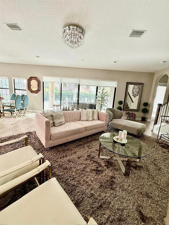 Chandelier, Dining room, Interior, Living room, Recessed Lighting, Wood Texture Flooring