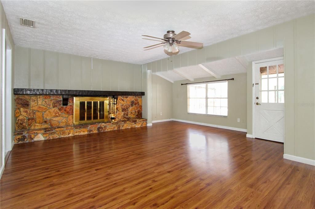Empty room, Fireplace, Interior, Stone Walls, Wood Texture Flooring